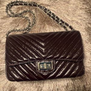 Sara Burglar quilted chevron purse.